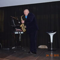Moderator und Saxophonist RusAlex auf einer Weihnachts-Firmenfeier – buchen in Hameln und Hannover